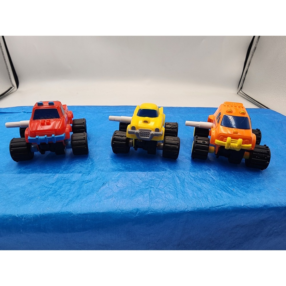 Vintage McDonalds Happy Meal Monster Truck Toy Lot Red Yellow Orange Set of 3